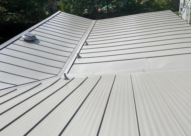 Solar attic fan installed on a metal roof for Roof Ventilation in Yucaipa